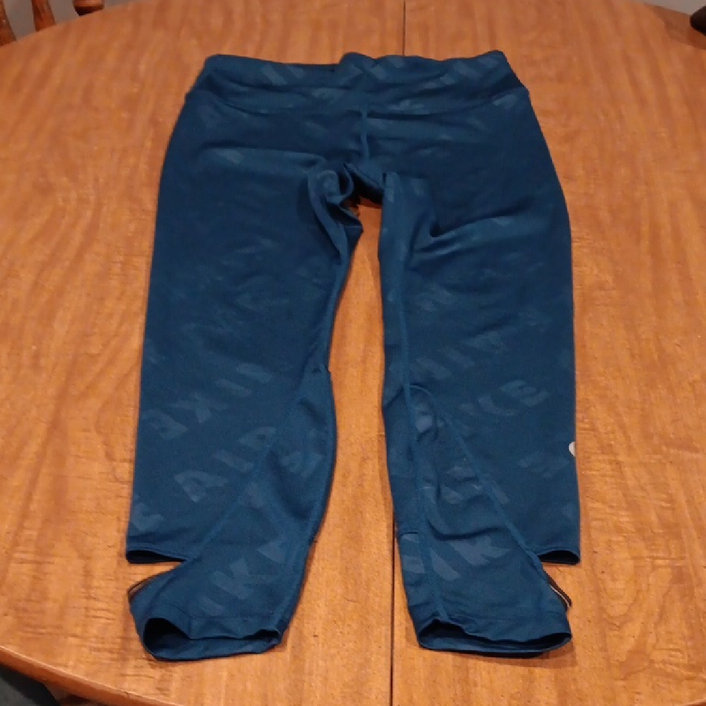 Nike Teal Leggings with Logo Pattern